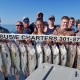 Group holding large catch of rockfish on Miss Susie Charters