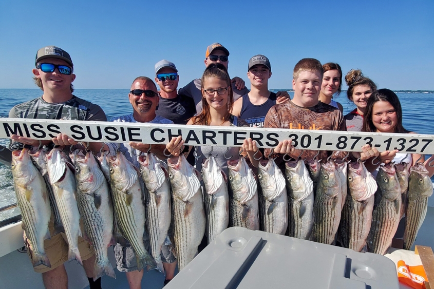 Group holding large catch of rockfish on Miss Susie Charters